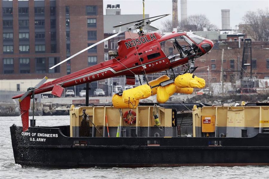 Helicopter Crashes in New Yorks East River.