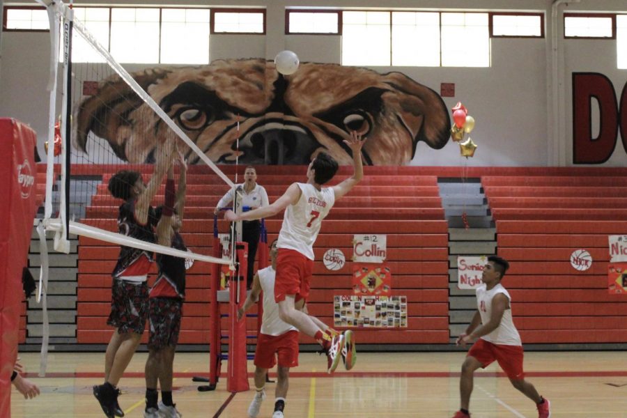Justin Whitehead spiking the ball
