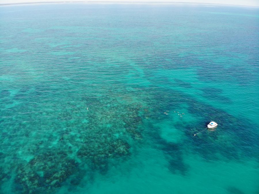 Drone footage of Island Ventures boat anchored on the outskirts on Grecian Rock reef.