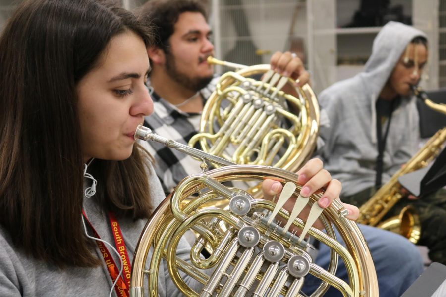 French Horn players Zachariah Perez and Valentina Aponte practice blending