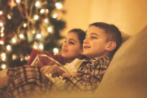 Happy children watching Christmas movies