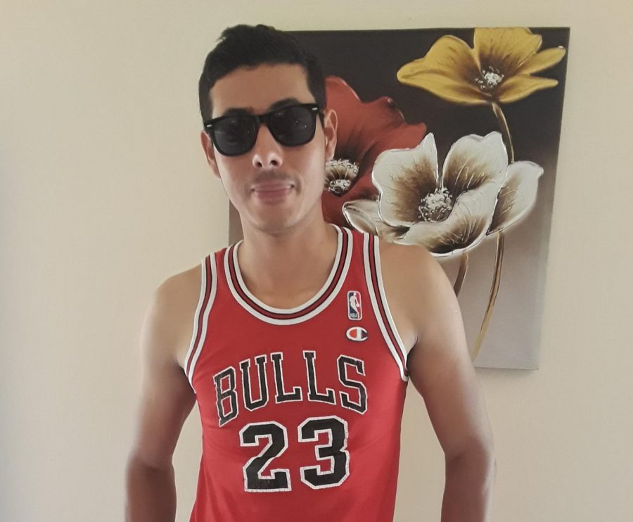 Alexis+Levy+poses+proudly+for+the+camera+with+his+Bulls+jersey+and+his+shades+on.