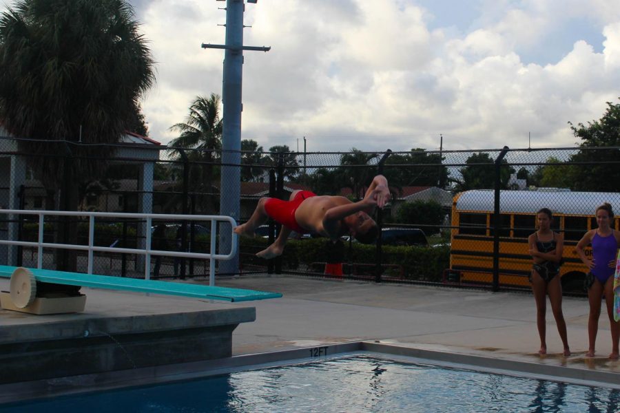 Bradley Wampler shows off his skills during South Broward swimming competition on October 10, 2019
