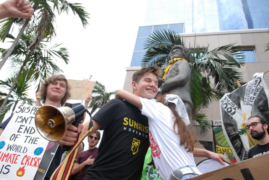 A student leader from the Sunrise Movement in Florida hugs a fellow protester after rallying up the crowd at the Global Youth Climate Strike on September 20, 2019. The Climate strike was organized by many schools and local movements like 360 Broward and the Sunrise Movement. 