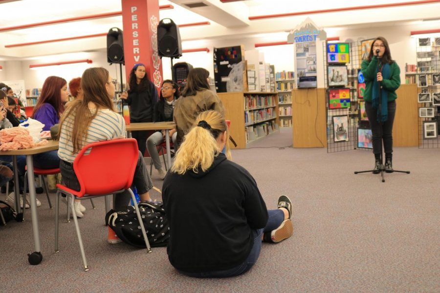 SBHS student Sabrina, sings at the media center during the schools Art Week. Every year in the month of January, Art Week is full of presentations and performances, including drama and singing.