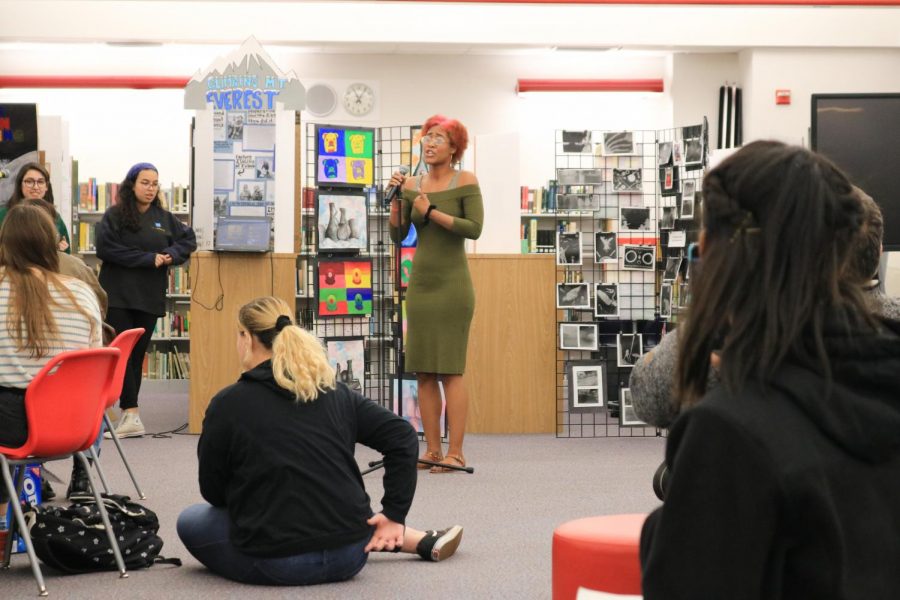 SBHS student Aaliyah Johnson sings on behalf of the drama club at the media center for the school’s art week. Every year in the month of January, Art Week is full of presentations and performances, including band performance, sing, theater, and paintings at the media center. 