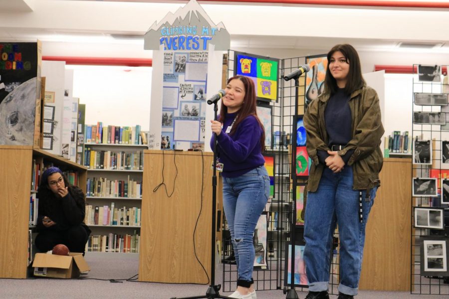 SBHS students Dahliah Rivas (left) and Bianca Preston (right) sing during lunch time at the media center for Art Week. Every year in the month of January, Art Week is full of presentations and performances, including drama and singing.