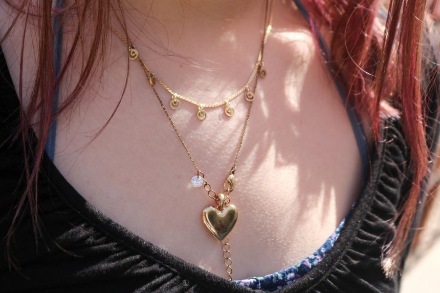 Alexis McMurray shows off her stunning gold necklaces given to her by her grandma. 