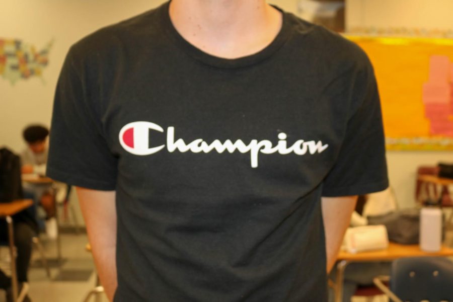 Colton Bueter wears his favorite brand Champion to make a fashion statement at school. 