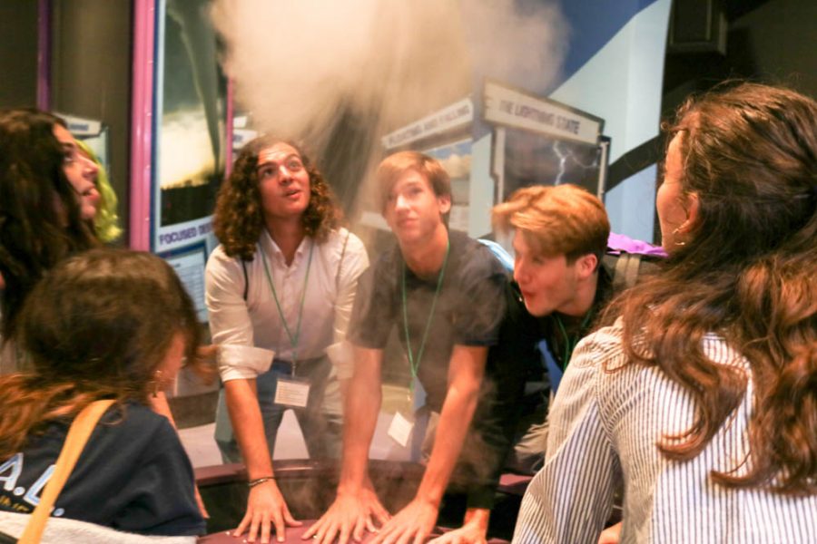 SBHS Coral Club members learn the science of a tornado through a fun activity. The students allowed the smoke to build up and created a huge faux-tornado.