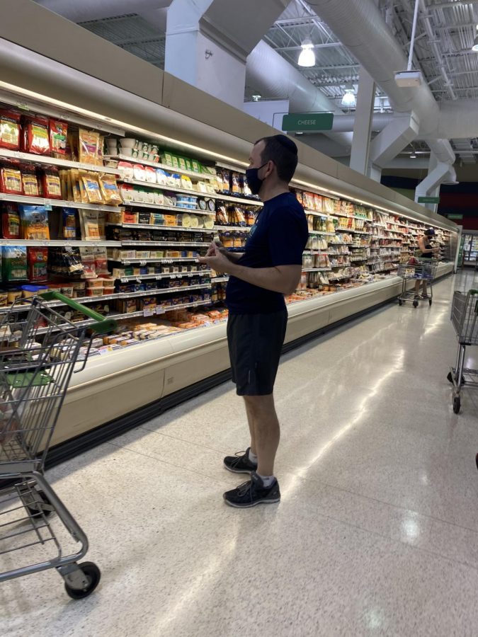 Customers of Publix make sure they keep their distance as they are shopping.