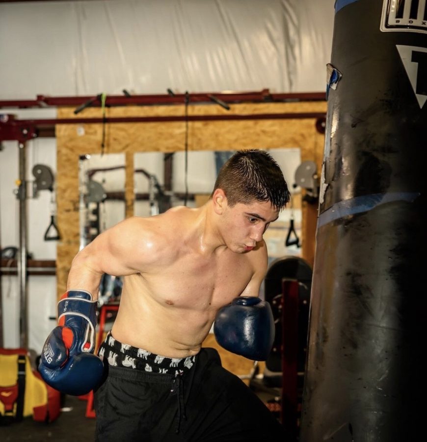      Jonathan Blanco, 19, trains with a punching hung up in a warehouse he frequents to prepare for his debut boxing match in December 2020.