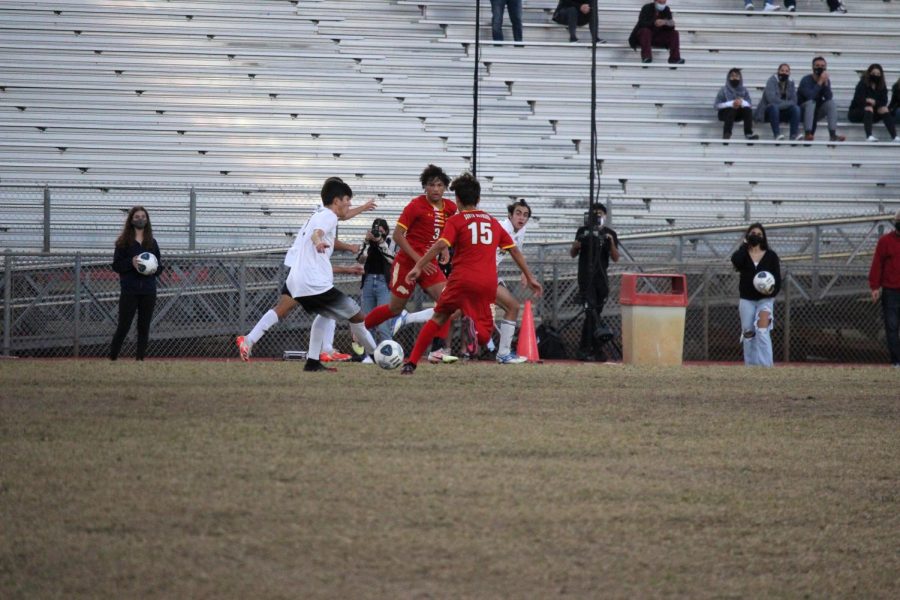 Two Everglades defenders approach the SBHS goal, but the defenders are not letting them score.  South Browards defenders did their job well, allowing for SBHS to bring the ball back to the other end of the field. 