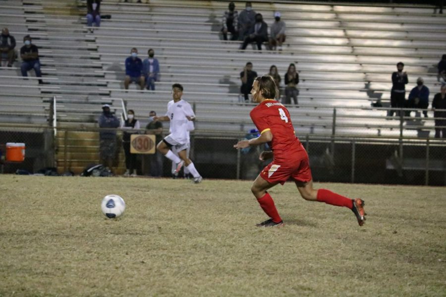 SBHS Player Cristian Rodriguez runs up field with the ball