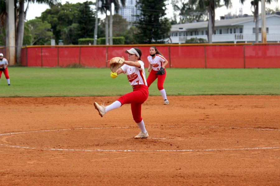 SBHS senior, Taylor Scirghio, pitches to a player from Pompano High School. Scirghio pitched strike after strike at the home game on February 25, striking out the Pompano player.