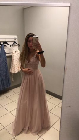 Isabel Gleeson, senior, is trying on the perfect dress for the perfect day