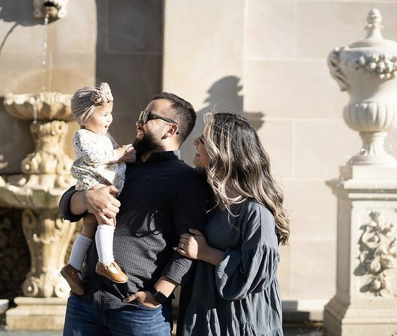 Richard spending time with his family and his daughter.