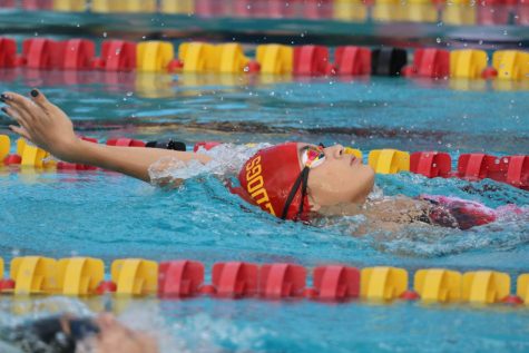 SBHS swimmer competes during a home heat in the backstroke. 