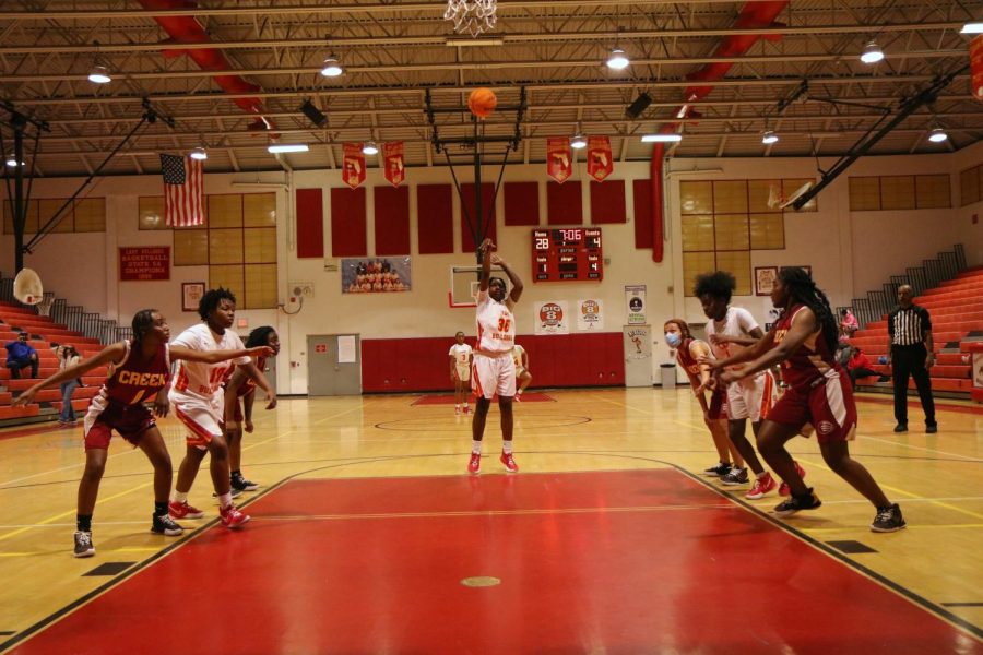 Bulldogs Forward Kamyra Butler attempts a free throw in the second quarter against Coconut Creek.