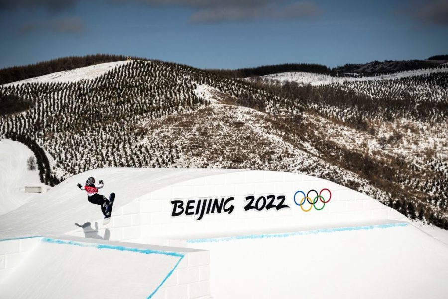 An athlete takes part in a snowboard slopestyle practice session at Genting Snow Park in Zhangjiakou on February 3, 2022, ahead of the Beijing 2022 Winter Olympic Games. (Photo by Marco BERTORELLO / AFP) (Photo by MARCO BERTORELLO/AFP via Getty Images)