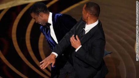 Will Smith harshly slaps Chris Rock during the 2022 Oscar ceremony on live television. 