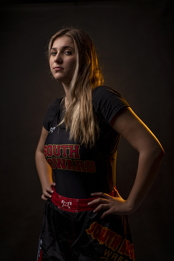 SBHS Girls Wrestling captain Hannah Olstein stares down the camera with her hands at her side.