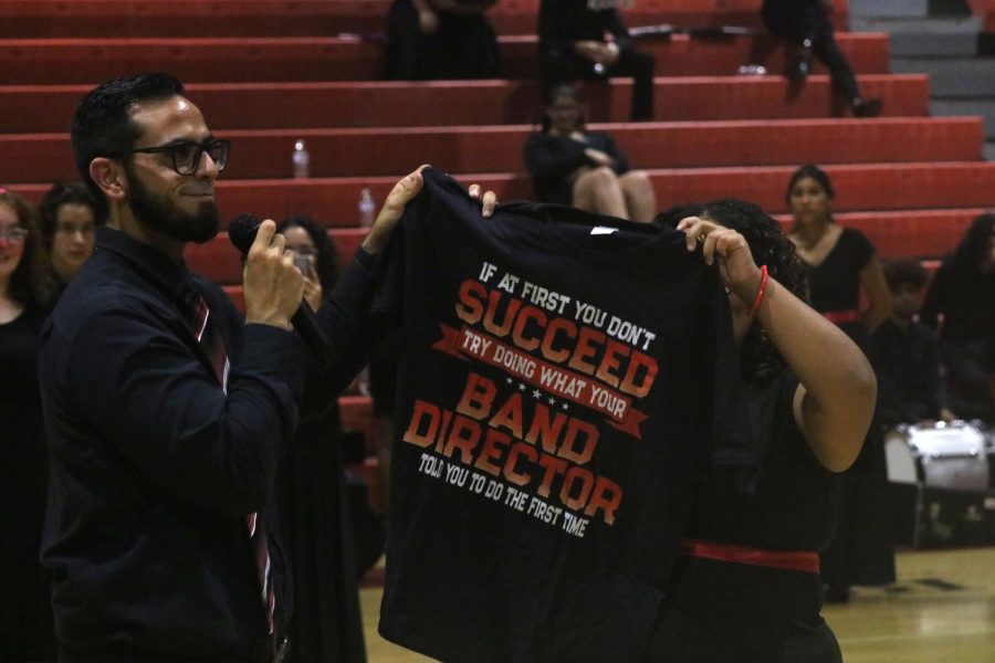 SBHS band members organizes a surprise for their band director Victor Villaoduna, a shirt with a message that says If at first you dont succeed, try doing what your band director tell you to do the first time.

