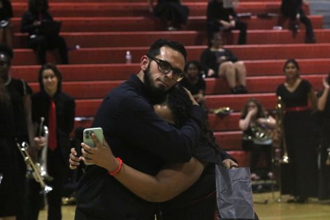 We closed the concert with an emotional embrace between the band director Victor Villaoduna and the student representing the band.