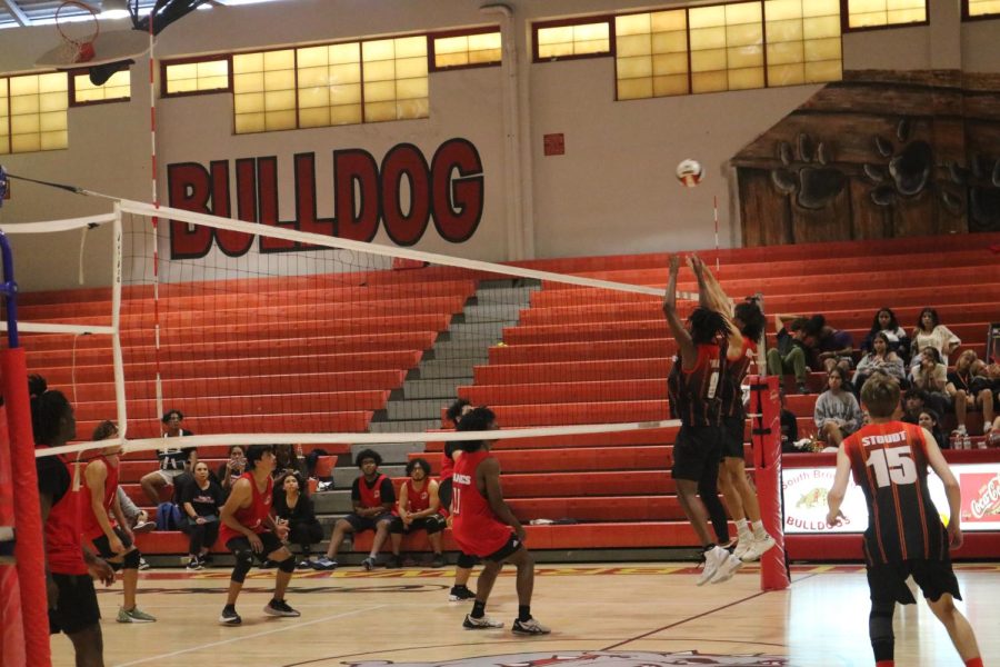 SBHS Malick Tall and Thomas Neuberger double block their opponents serve.