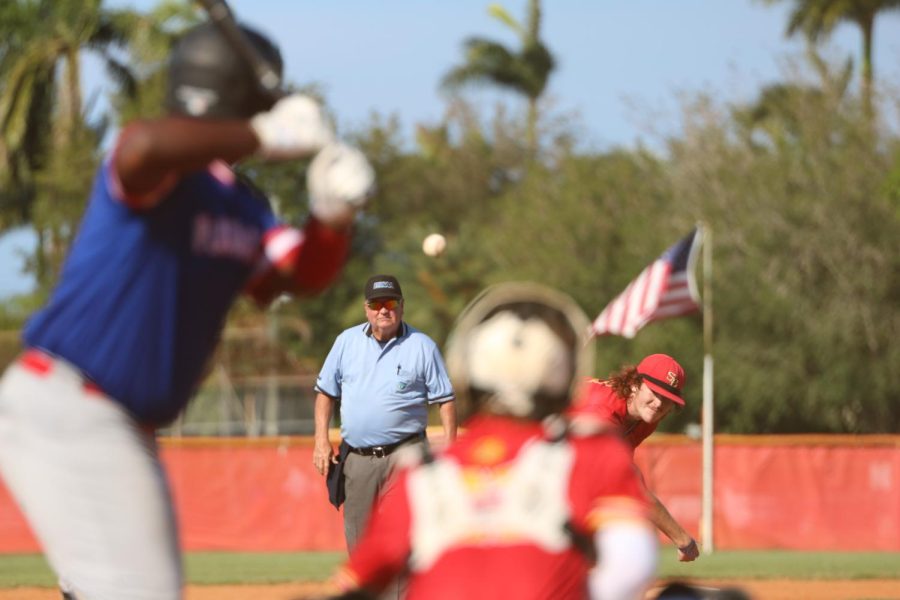 SBHS baseball player Quinn Kustin pitches to opposing teams batter.