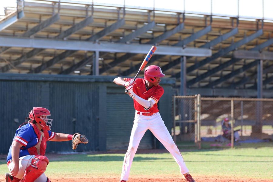 SBHS baseball player Gabriel lydia waits in batting stance preparing for the pitch.