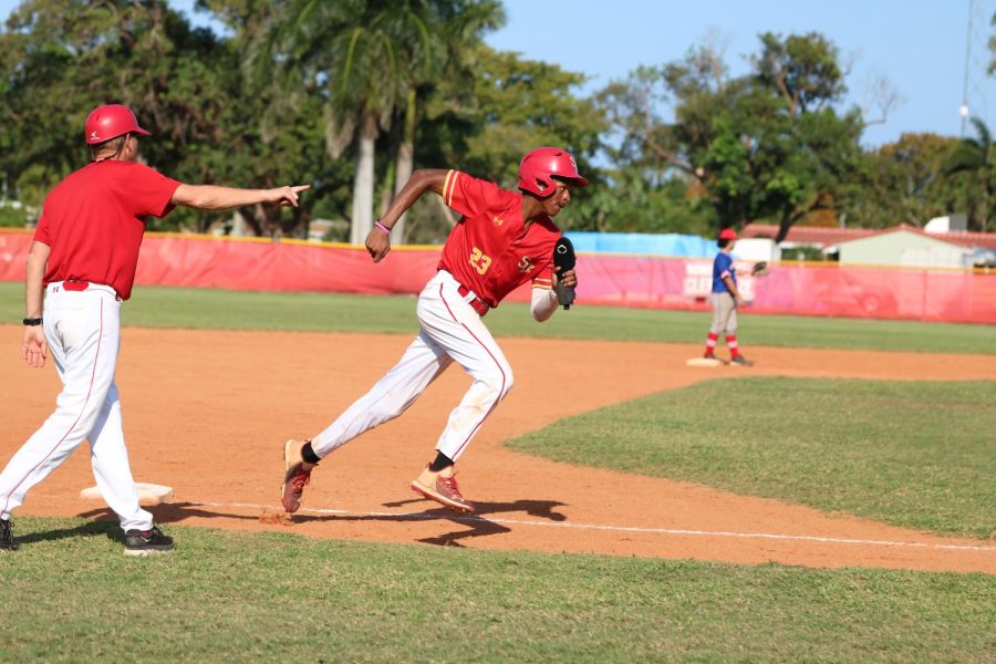 SBHS Baseball player Gabriel Lydia runs from third base.  