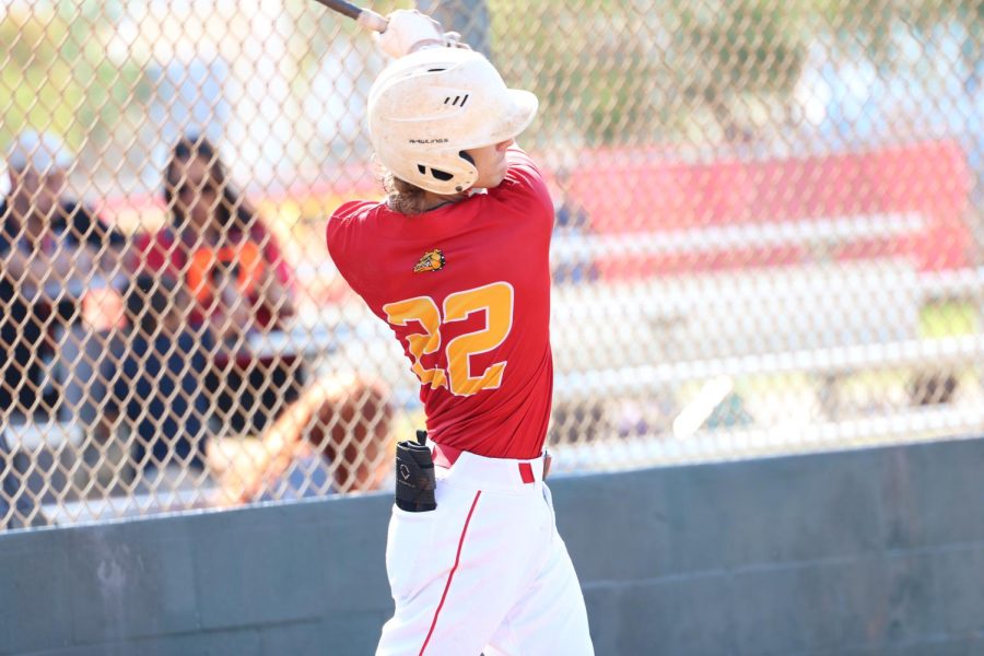 SBHS Baseball player Thomas practices his hits before going up to the bat.