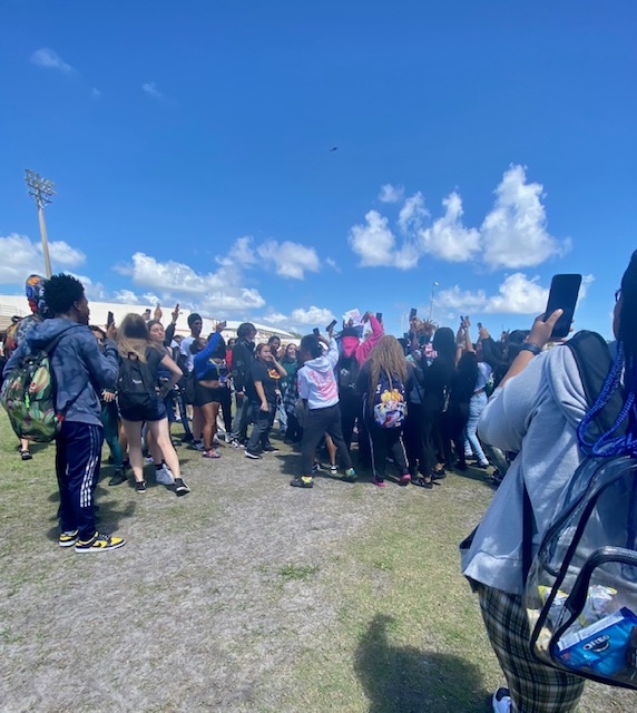 SBHS+students+chant+and+hold+up+signs+++during+a+walkout+protesting+gun+violence.+The+national+walkout%2C+initiated+by+Students+Demand+Action%2C+was+staged+on+April+5.