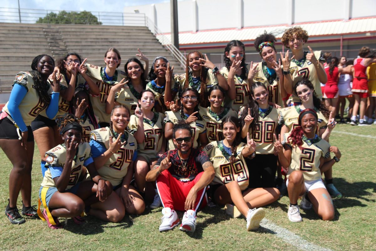 These young girls are the Juniors who just defeated the Senior class in a friendly, yet competitive game of flag football at the annual PowerPuff Game that is performed at SBHS each year against the Junior and Senior class.