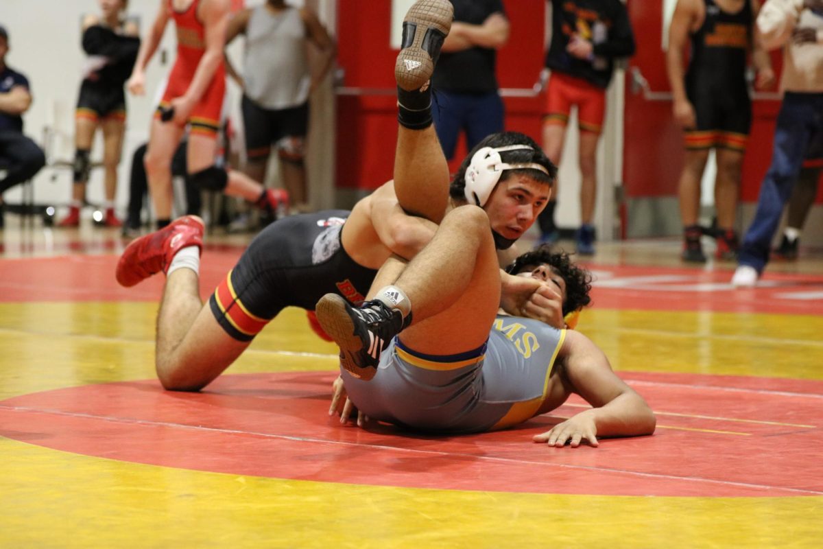 South Broward sophomore athlete Mateo hits a cradle on the opposing team.