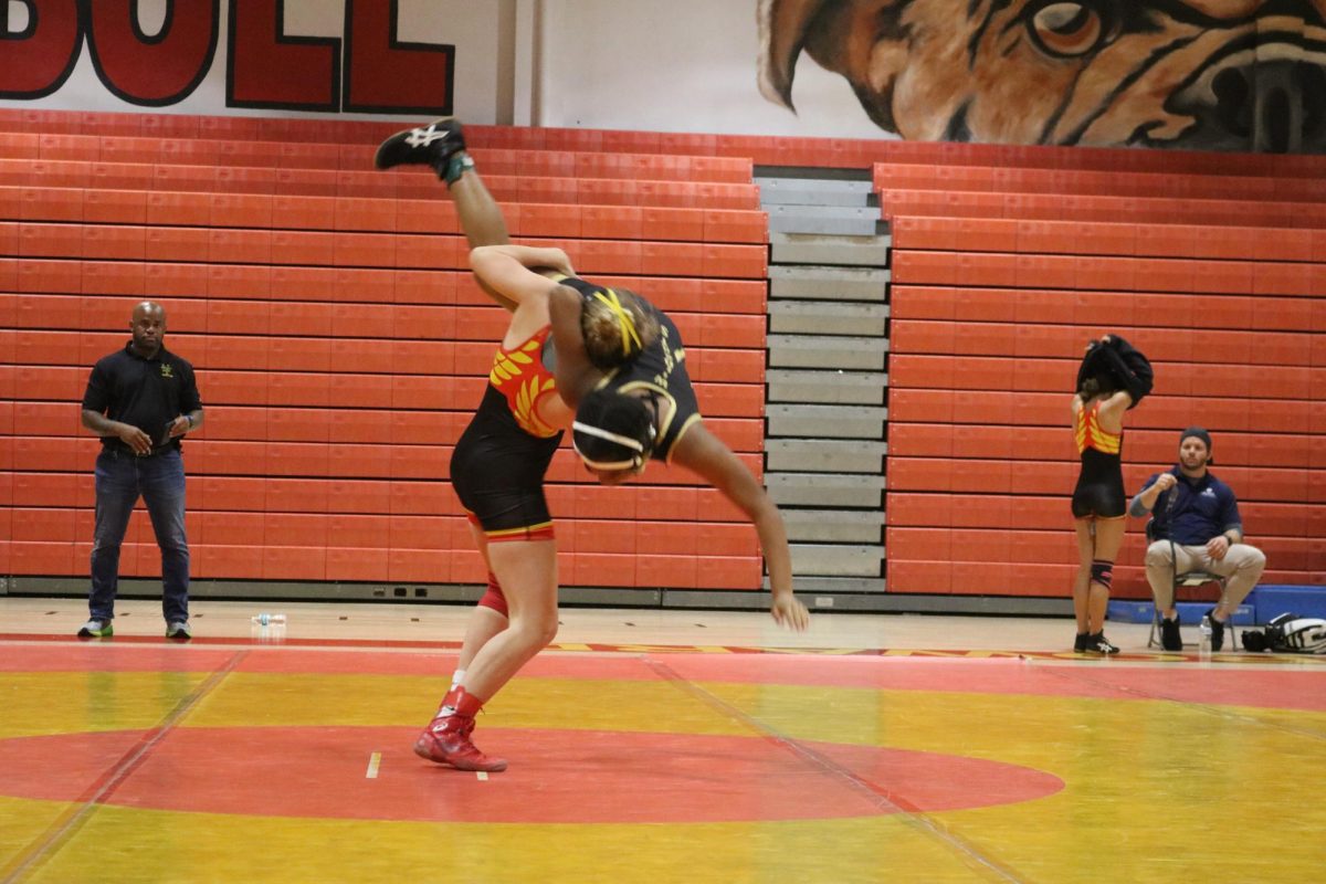 SBHS student athlete, sophomore Athena Hawn mat returning her opponent going for the pin.