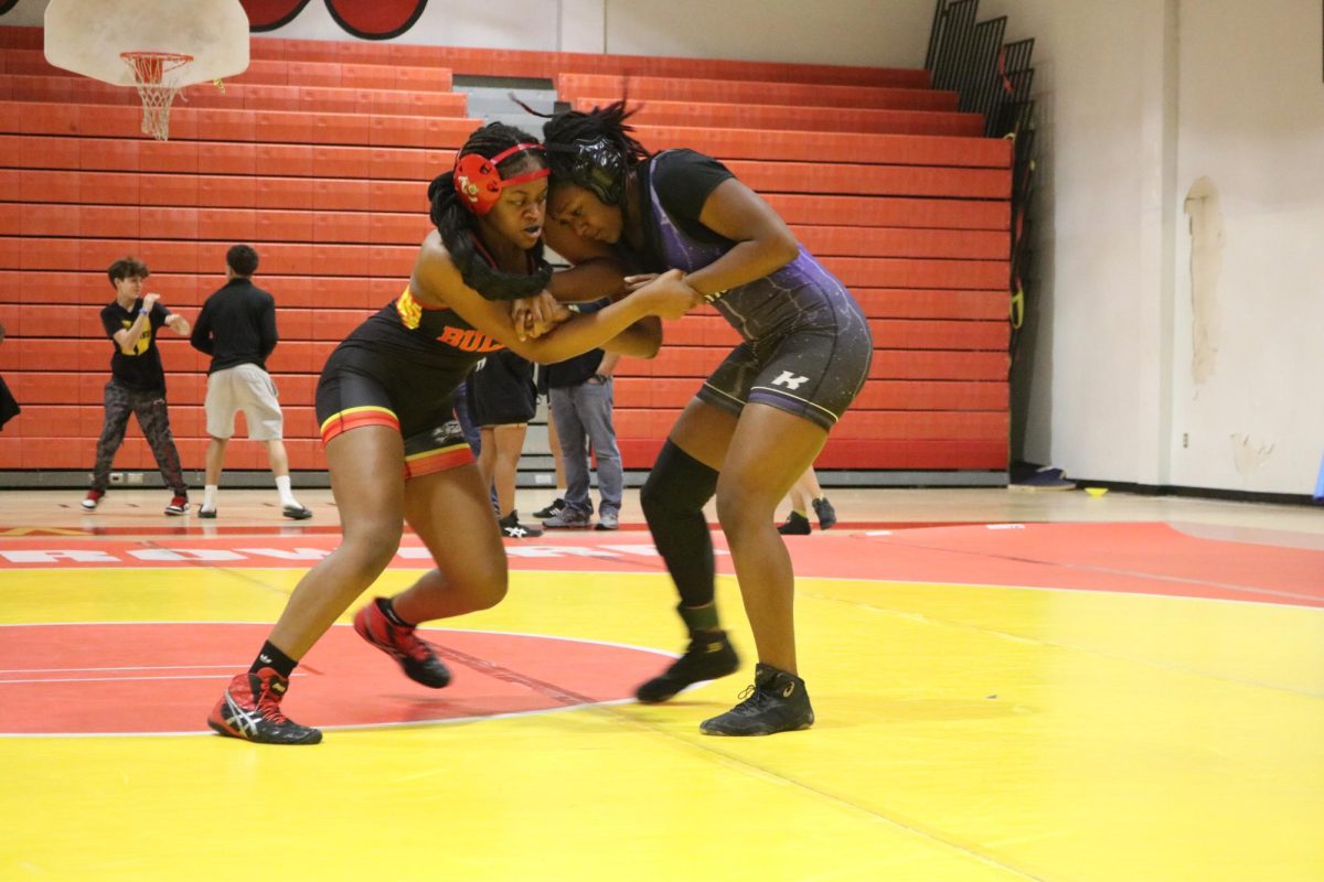 SBHS student athlete, Thavassa trying to take her opponent down by head and arming her to the mat.