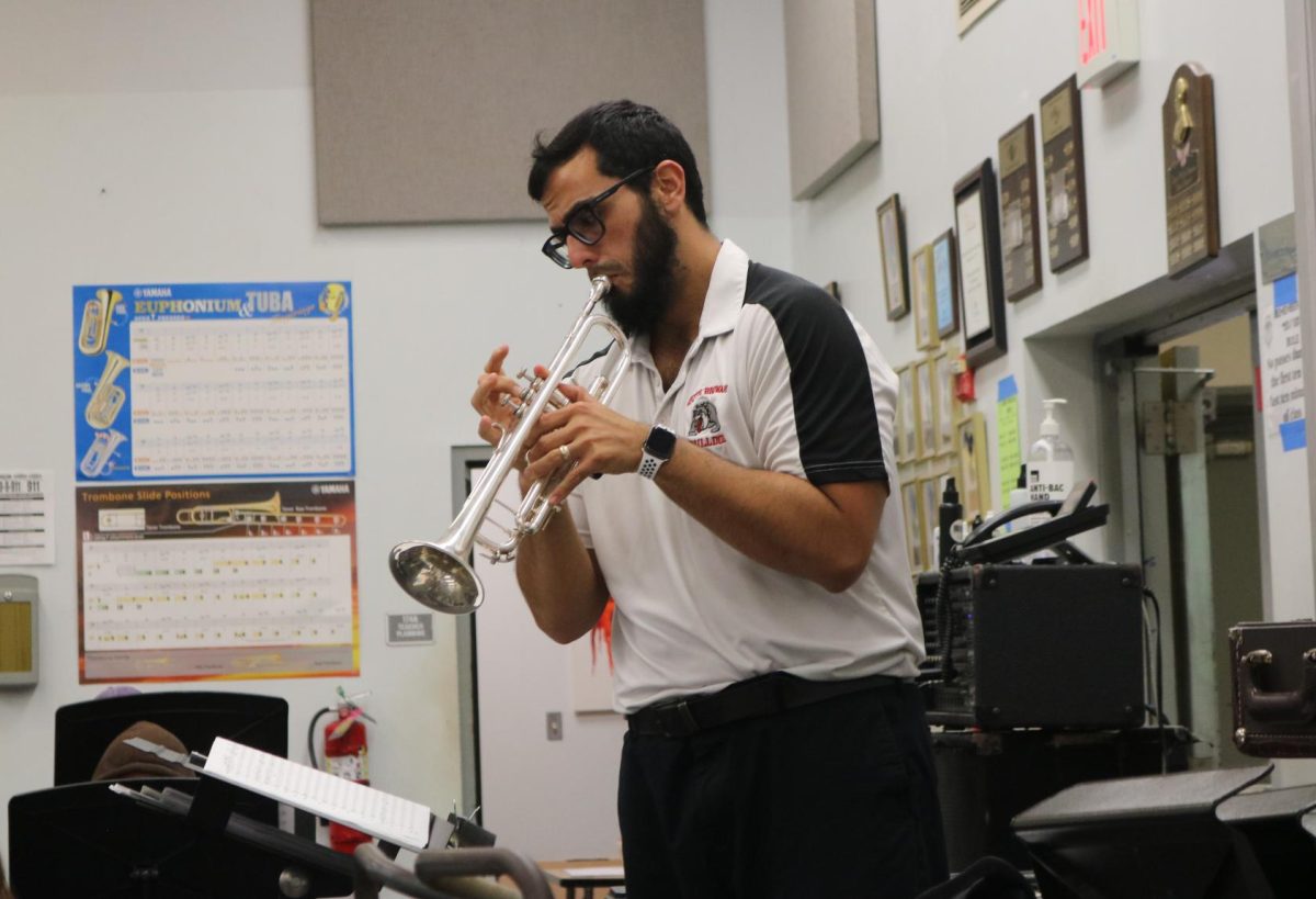 Mr. V puts on a remarkable yet simple class demonstration of the right tunes for his students to have a better understanding of what to preform the next time he asks his students to to play this specific tune.
