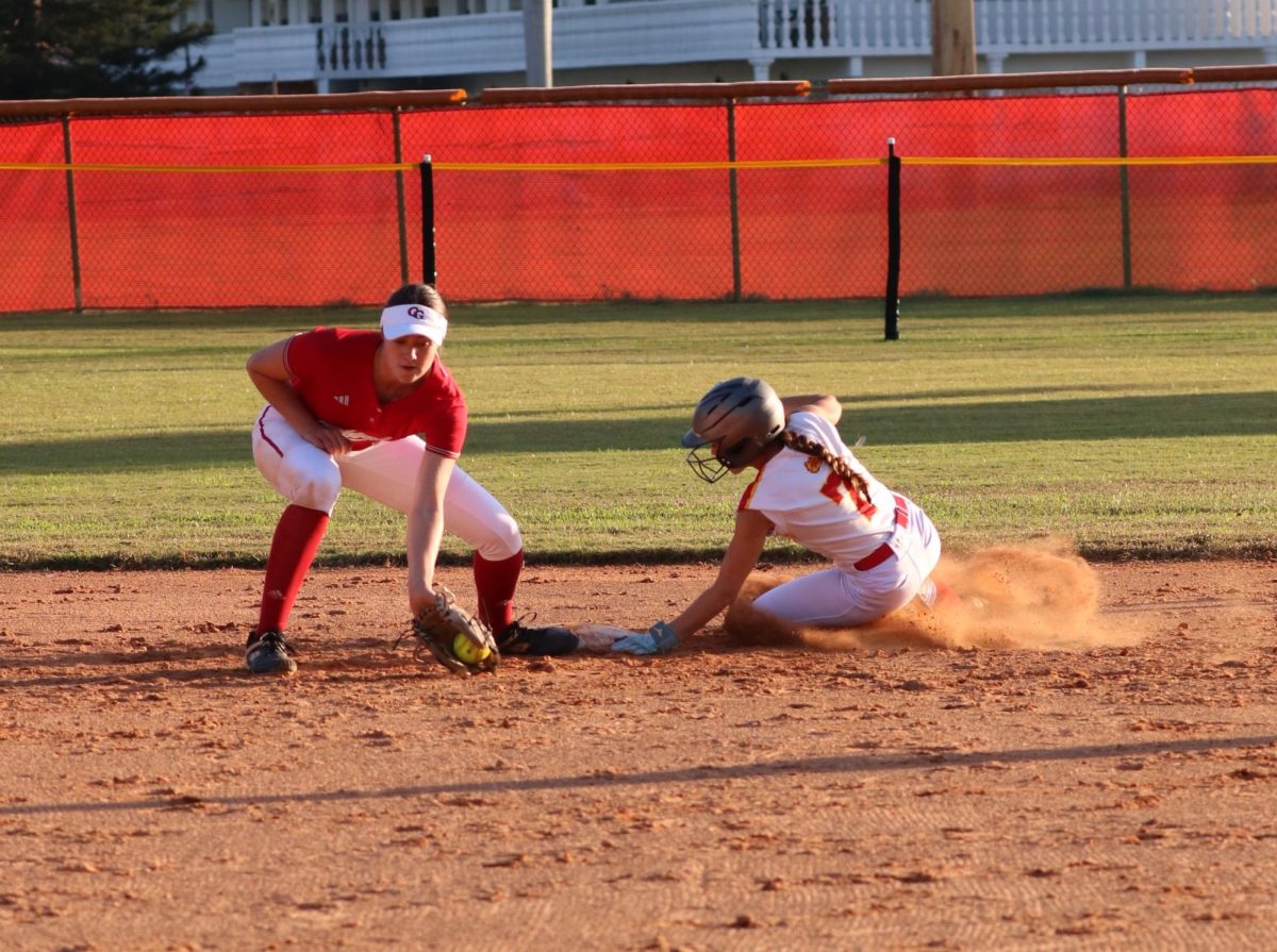 Angelina Romero blazes a trail as she slides into second base, clinching a double with finesse and flair. Later, Romero would make her way to third base after teammate Onya Lee-Golightly got a hit.