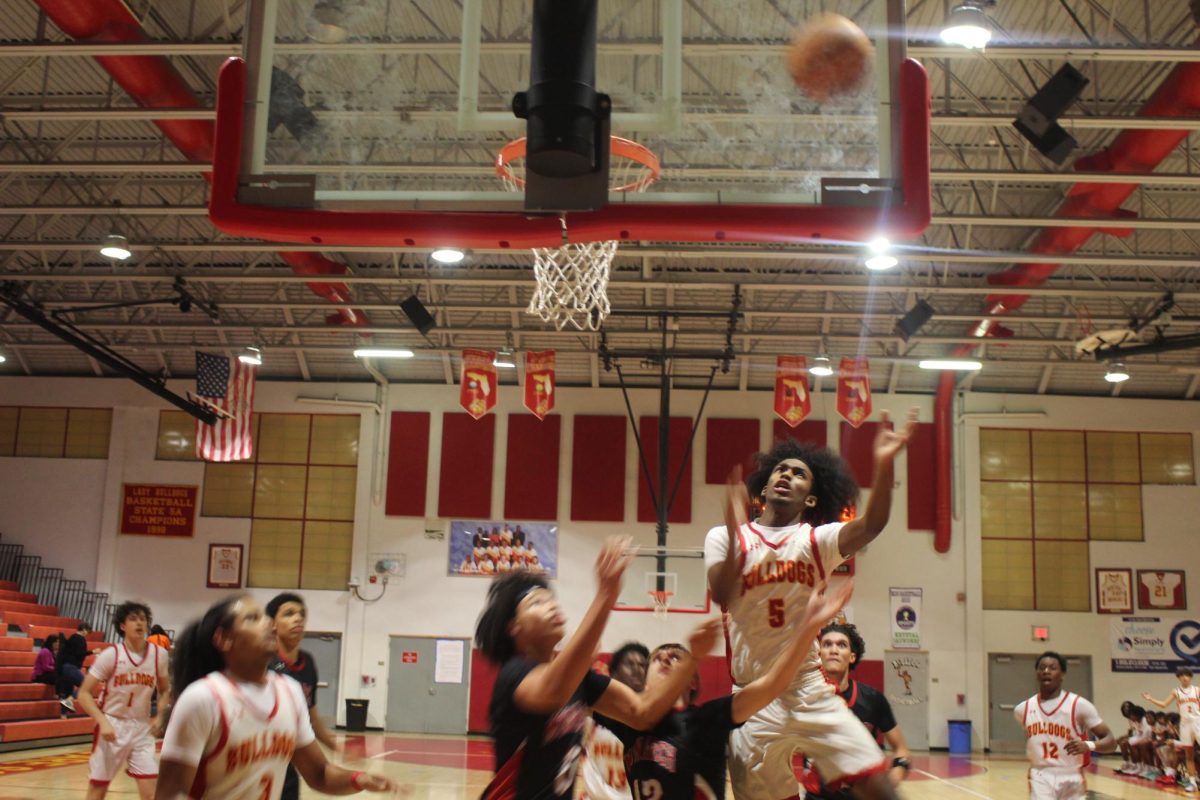 SBHS sophomore, Justin Braddy scores a layup.