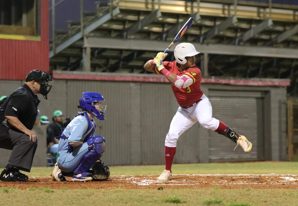 Marerro loads up to get ready to hit a pitch from the Coral Springs pitcher.