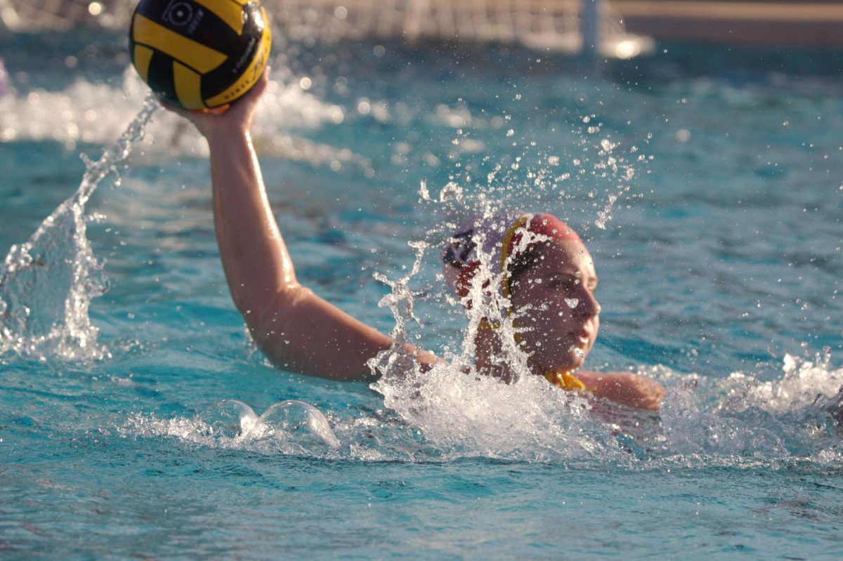 Co-captain Ayla Kayan takes a shot to score a goal.