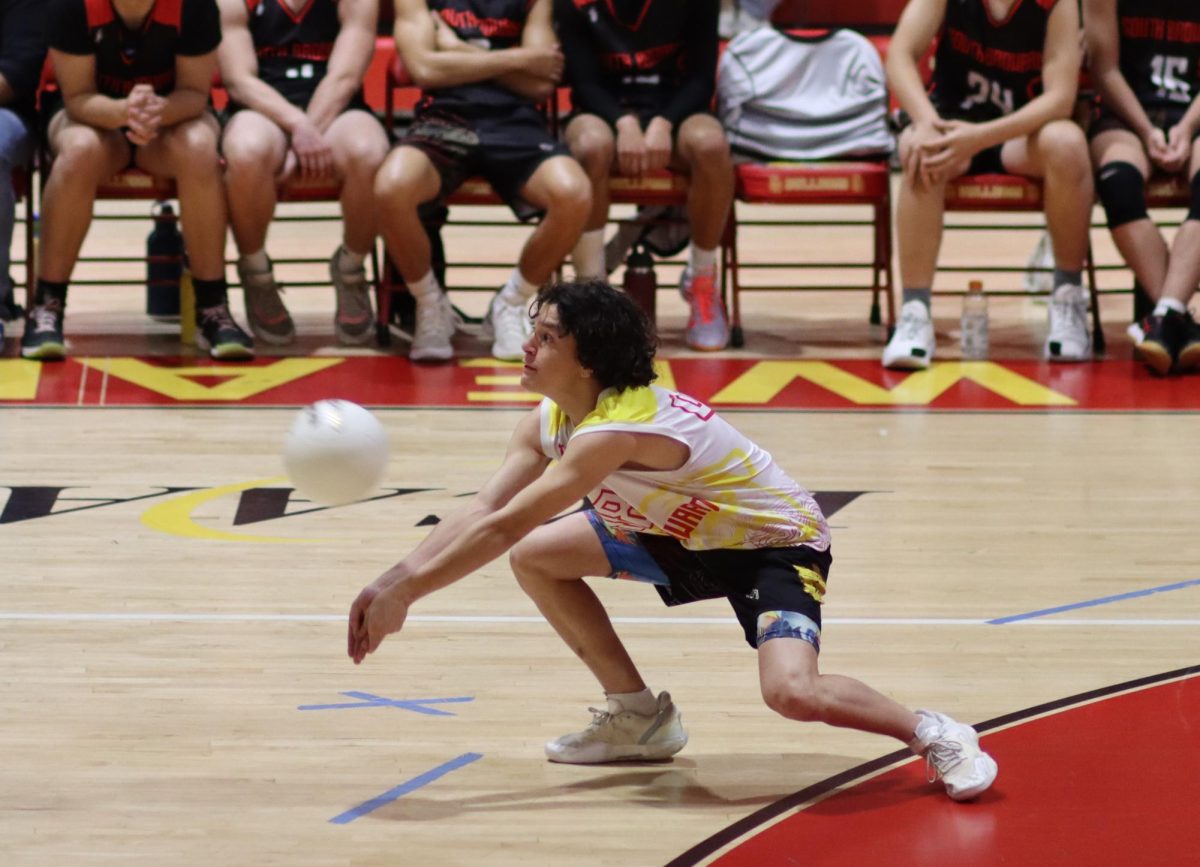 Sophomore sensation Aliaksei Bartlou refuses to quit, making a diving save to keep the play alive.