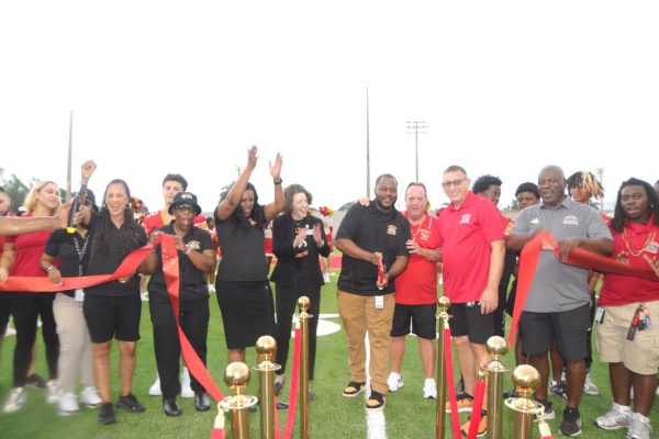 On August 22nd, South Broward High School's Principal Alex Francois cuts the ribbon introducing the new and improved football field.