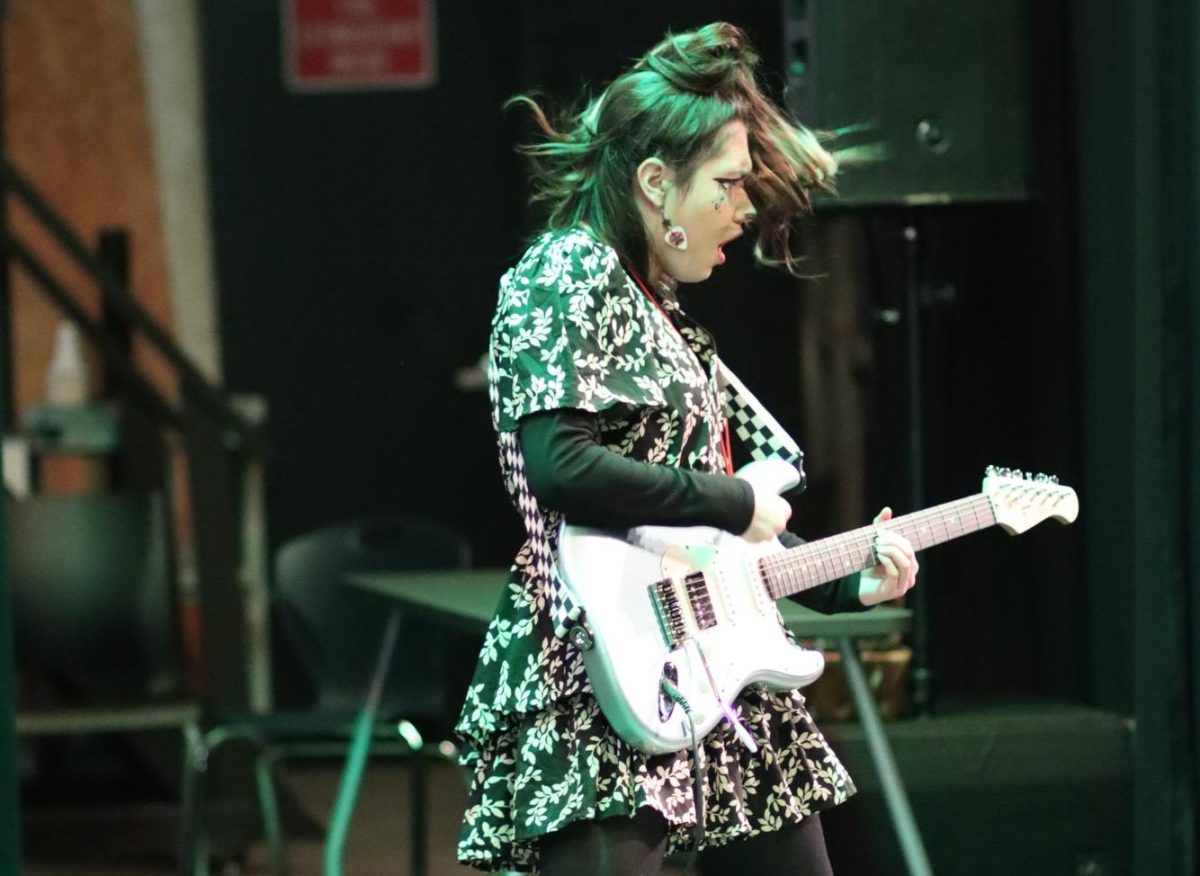 SBHS sophomore Twyla Heieck feels the electric vibes during the Guitar Club's first performance. 