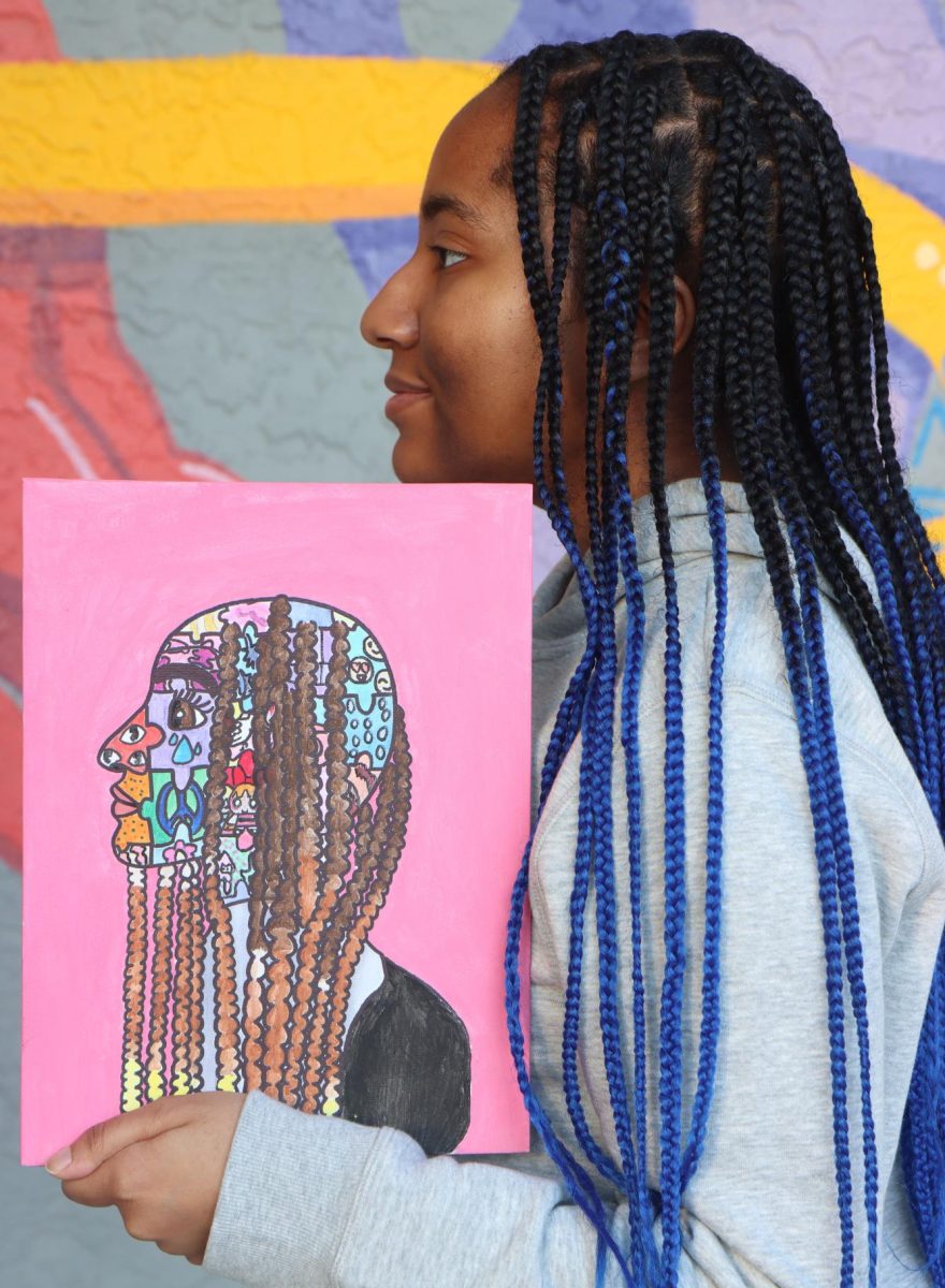 SBHS senior Na'Shia Oliver poses with a self portrait. 